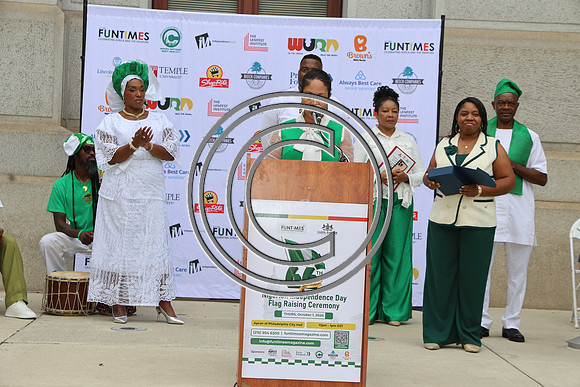 PHSL0182. Nigerian Flag-raising Ceremony at City Hall for Funtimes Magazine October 1, 2026 ktiplaura