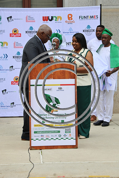 PHSL0204. Nigerian Flag-raising Ceremony at City Hall for Funtimes Magazine October 1, 2026 ktiplaura