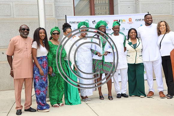 PHSL0243. Nigerian Flag-raising Ceremony at City Hall for Funtimes Magazine October 1, 2026 ktiplaura