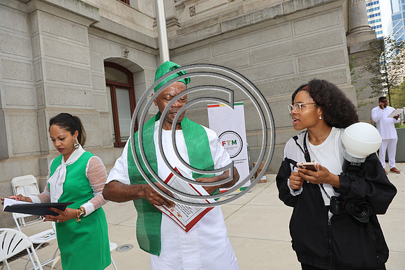 PHSL0042. Nigerian Flag-raising Ceremony at City Hall for Funtimes Magazine October 1, 2026 ktiplaura
