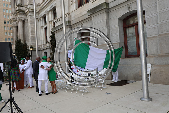 PHSL0019. Nigerian Flag-raising Ceremony at City Hall for Funtimes Magazine October 1, 2026 ktiplaura