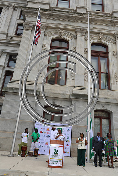 PHSL0084. Nigerian Flag-raising Ceremony at City Hall for Funtimes Magazine October 1, 2026 ktiplaura