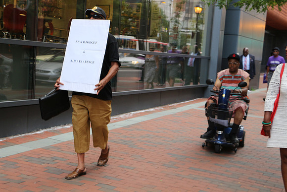 Raised in Philly Tomorrow, mourn that human beings were bought, sold and owned in Center City Philadelphia. 08202014 PHOTOS BY  LAURA ELAM (173)